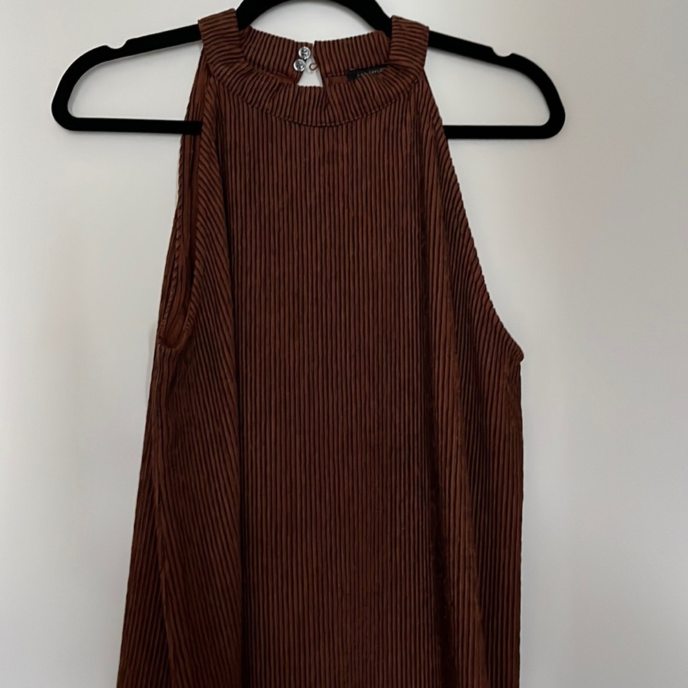 Ann Taylor ladies dress blouse, sleeveless with button detail at back of neck
